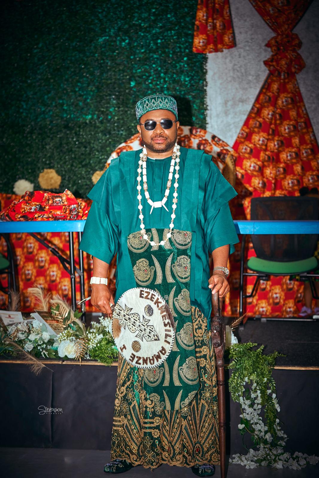 Igwe Dr. Amanze N. Ikwu standing in full traditional regalia